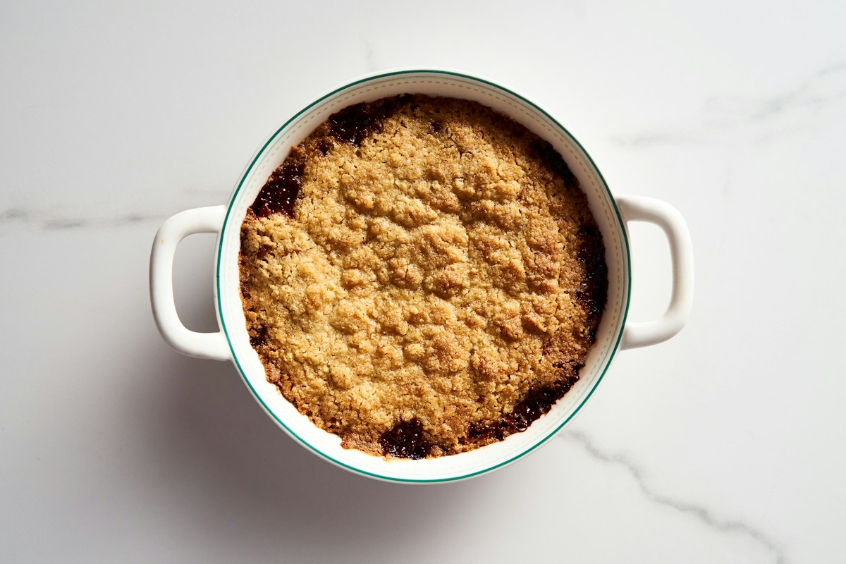 Apple crumble with a golden topping and caramelized apple filling